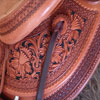 Half tooled Vaquero Lace with Daffodil flower Wade Saddle      
built on a 94 degree bar that fits a well built muscular shoulders -
The seat is finished at 15 & 1/2 inch with a close contact deep pocket fit -
Gullet is 7 & 1/2 inch height by 6 & 1/2 width with the back hand hole width at 4 inch -
Horn is 6 inch height by 5 and 1/2 inch width Guadalajara at 31 degree pitch - Cantle is 4 and 1/2 inch in height by 12 & 1/2 in width with a Cheyenne roll - Flat plate riggin at 7/8ths
- leather lined 5 inch Stainless Steel Moran Stirrups . 